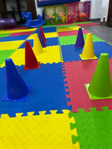 Child engaging in fine motor skills training at Star Tots